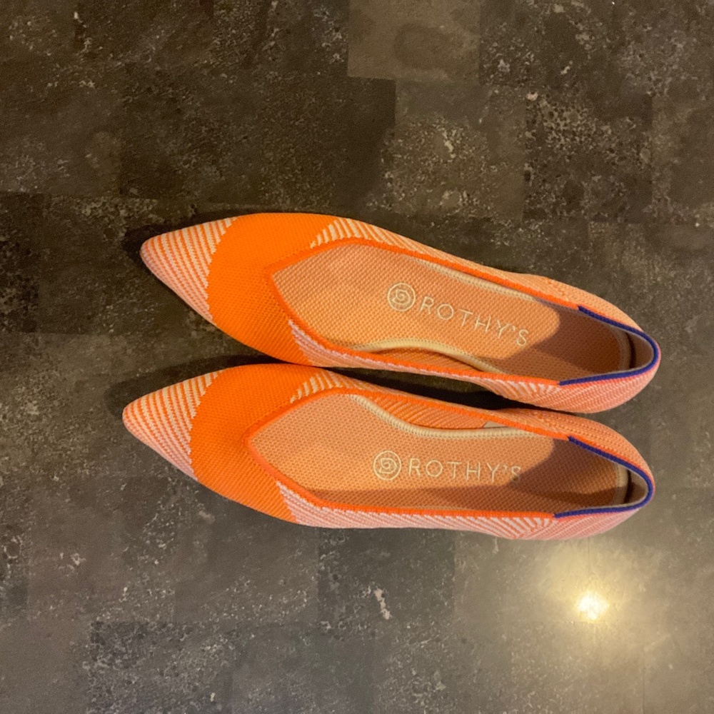 Rothy’s orange and white, used excellent condition